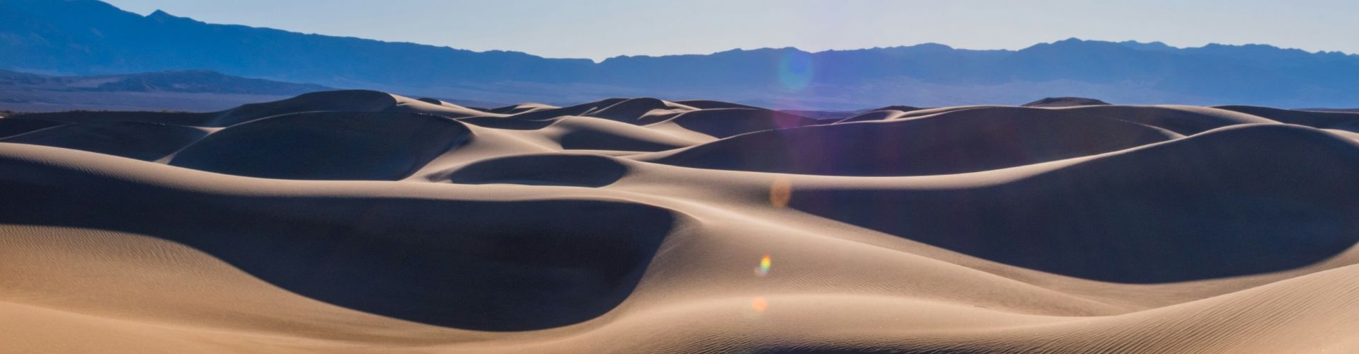 Jeeptour Endlose Sanddünen der Erg Chebbi nahe Merzouga – weiche Formen im Morgenlicht.